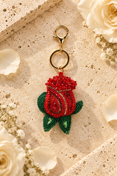 red rosebud made with glass seed beads and crystal detailing
