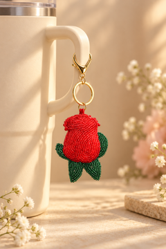 Rosebud beaded bag charm in red with green leaves