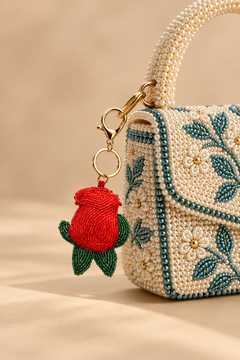 Boho Girl Rosebud beaded bag charm in red with green leaves
