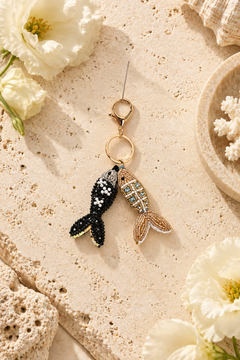 gold beaded fish with pale blue crystals and white bead edging
