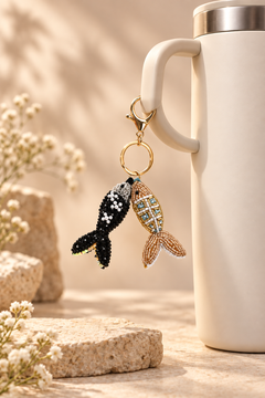 Gold-tone lobster clasp and key ring on the Twin Fish beaded keychain